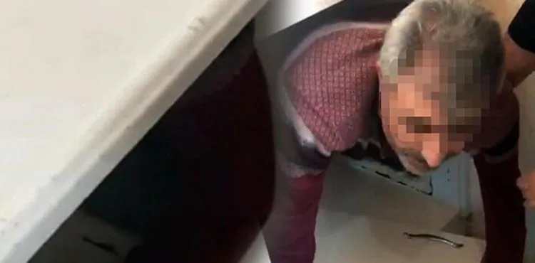 Cinayet şüphelisi, mutfak dolabındaki gizli bölmede yakalandı