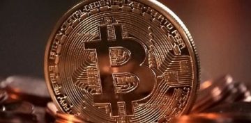 Bitcoin 58,000 dolarn zerine ykseldi