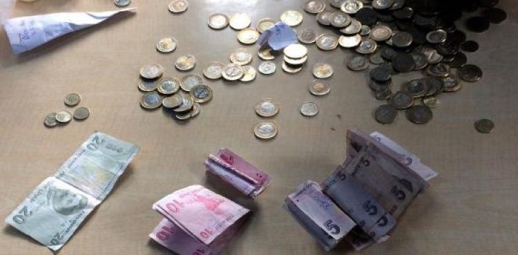 Dilencinin sakladığı paralar bebek bezinde çıktı